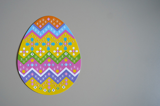 Children's Easter craft. Child's drawing of Easter eggs on white background