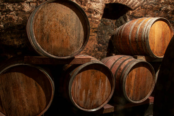 istock Wine barrels in an old wine cellar. 1507212895