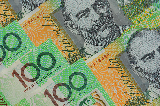 Australian $100 banknotes background, new uncirculated notes