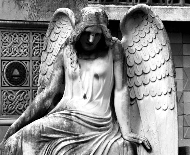 istock languid angel weeping at the grave 1507215259