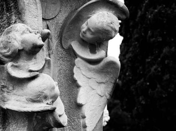istock busts of winged cherubs on the great tombstone 1507215968