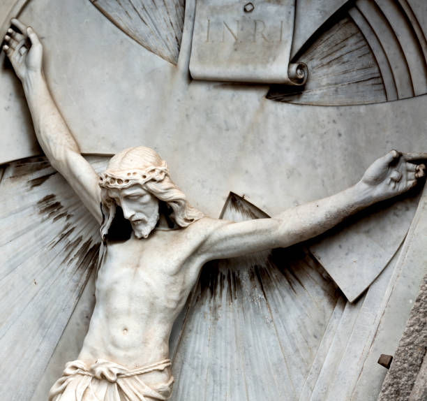 istock little white christ nailed to the cross 1507218092