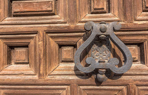 Mdina, Malta - March 10 2017: The red wooden doors of Saint Dorothys Convent in the heart of Silent City (Mdina)