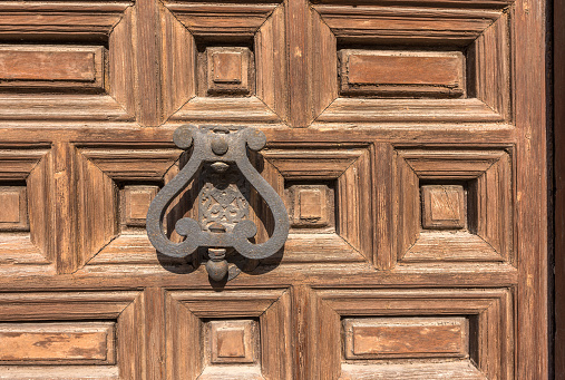 Medieval door of a house in Madrid.