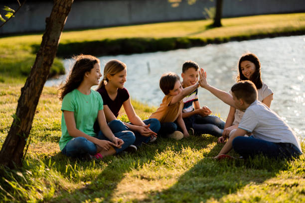istock Group of children bonding in nature 1507237310