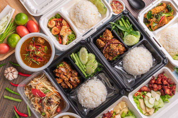 istock top table view of thai food in derivery box. 1507243220