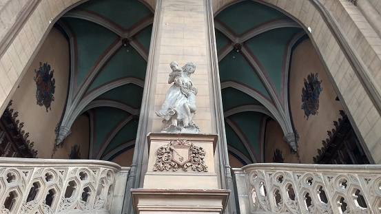 Detail of the entrance of the medieval city hall of Douai