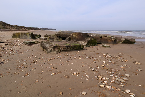 A World War 2 bunker crashed due to coastal erosion in the north of France on the beach of Wissant.