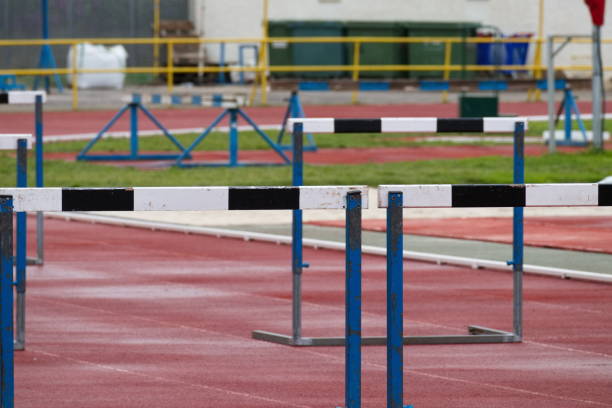istock Synthetic running track for sporting events with hurdles 1507276321