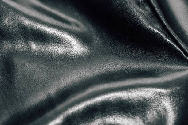 istock Chain on black texture eco soft leather, fashionable jacket 1507285667
