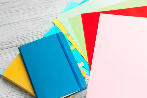 istock Notebook diary for planning in blue and yellow and colored cardboard for creativity 1507292745
