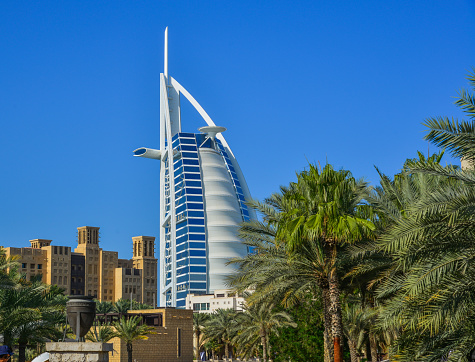 Dubai, UAE - Dec 9, 2018. View of Burj Al Arab hotel from Madinat Jumeirah. Madinat is a luxury resort which includes hotels and souk covering an area over 40 hectars.