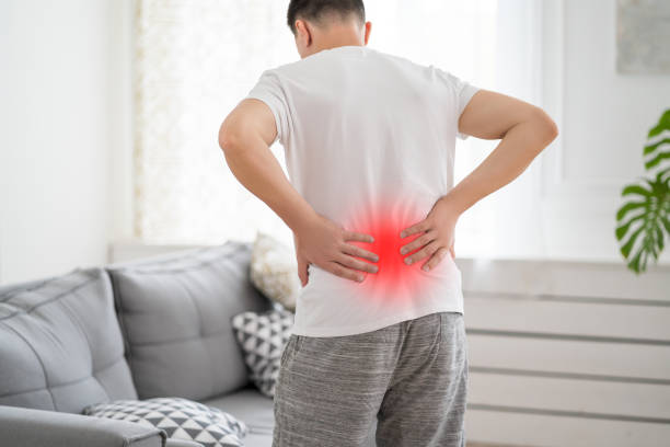 istock Back pain, kidney inflammation, man suffering from backache at home 1507403611