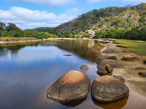 Tidal River flowing into Norman Beach on Wilson's Promotory National Park is a popular family holiday destination with safe beaches and bush land walks.