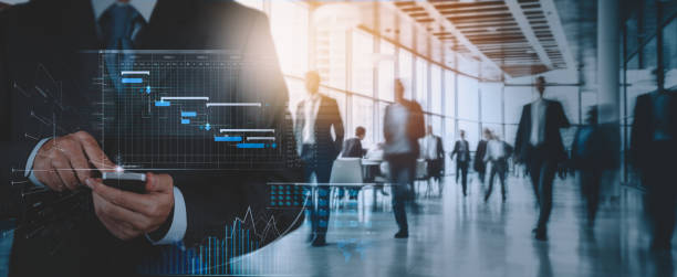 istock An analyst uses smartphone and dashboard for data business analysis and Data Management System with KPI and metrics connected to the database for technology finance, operations, sales, marketing. 1507425743