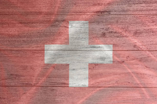Swiss Confederation flag blowing in the wind on a wooden table. Background texture. None, Bern, Zürich. 3d Illustration. 3d Render. stock photo
