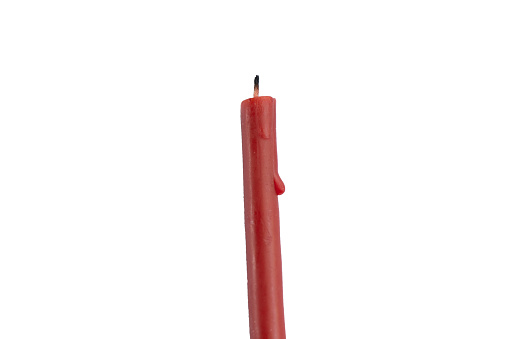 church red wax candle on white background