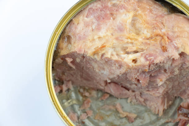 istock opened started canned jar with stew on a white background top view 1507565308
