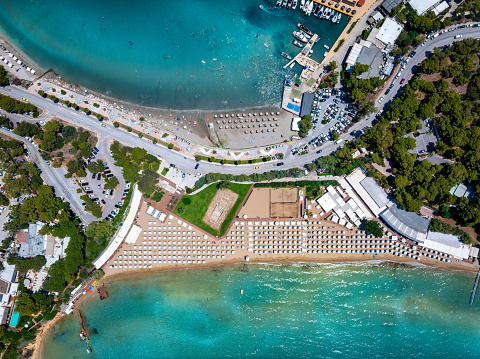Aerial topdown view of the famous Astir luxury retreat beach at the Vouliagmeni district of Athens, Greece
