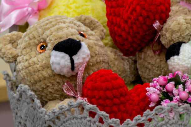 istock teddy bear with a heart in a basket 1507600896