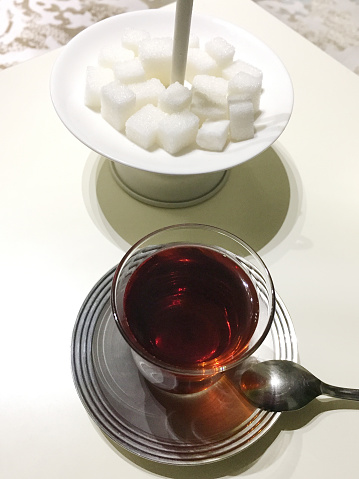 High angle view Turkish tea and sugar cubes on the table