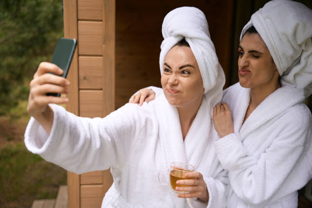 istock Young female taking photo with her friend 1507671767