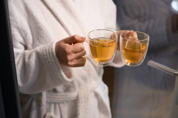 istock Young lady entering in room with drinks 1507671770