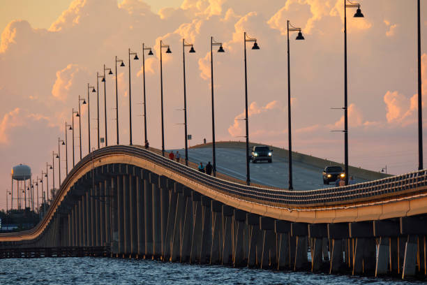 istock Barron Collier Bridge and Gilchrist Bridge in Florida with moving traffic. Transportation infrastructure in Charlotte County connecting Punta Gorda and Port Charlotte over Peace River 1507696718