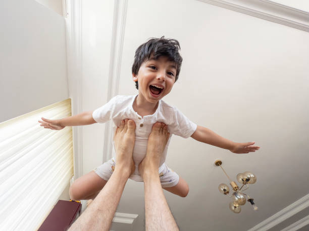 istock Father and son playing at home 1507725236