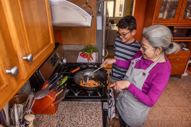 istock Senior Woman Cooking at Home 1507728379