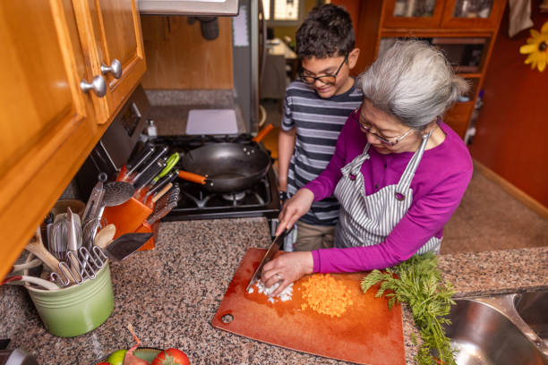 istock Senior Woman Cooking at Home 1507728383