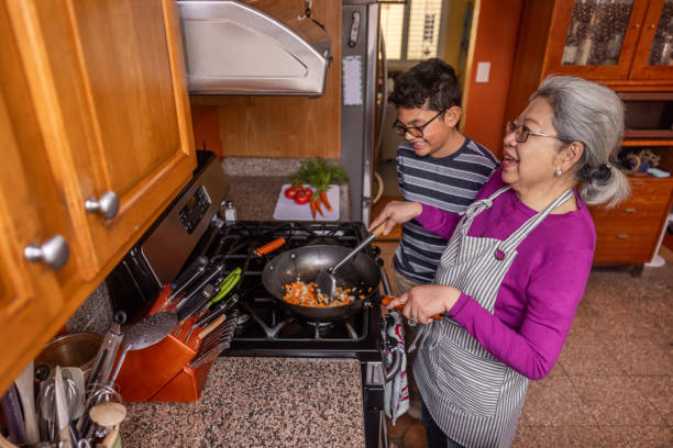istock Senior Woman Cooking at Home 1507728384