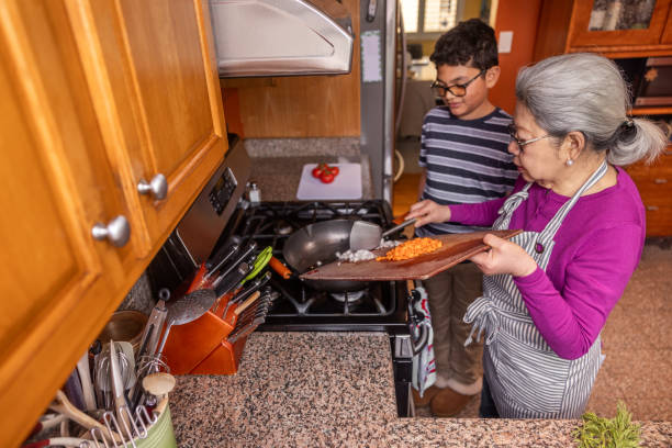 istock Senior Woman Cooking at Home 1507728397