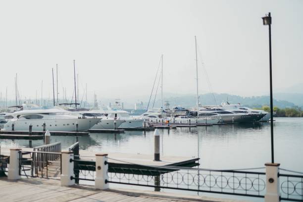 istock several boats docked on a river next to a bridge and a park 1507777330