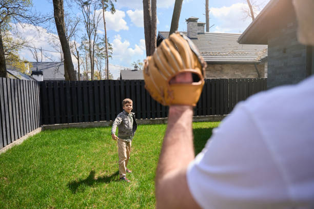 istock Man in a white t-shirt has fun playing with baby 1507783188