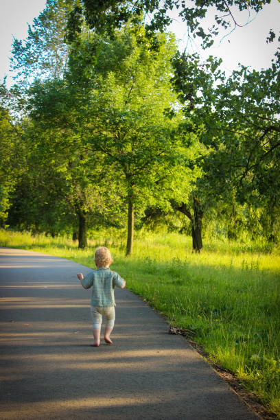 istock Child running through the park 1507785989