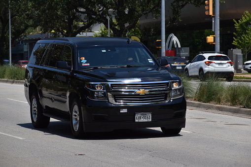 Houston, TX USA - June 28, 2023 - Chevy Suburban SUV cruising on Allen Parkway