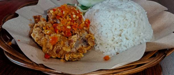 istock Geprek Chicken with chili sauce and Rice 1507848801