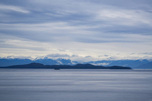 istock Alaska mountains covered by snow in a cloudy day 1507873644