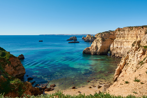 Solitary beach and lagoon close to Alvor. The hideaway place for the private beach holiday. Algarve region, Portugal