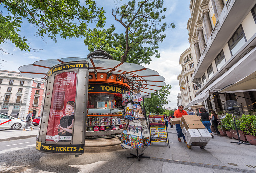 Madrid, Spain - June 21, 2023: Beautiful magazine, newspaper and souvenir kiosk on Calle Alcalá, in Madrid.