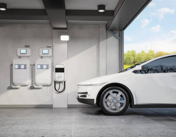 istock Ev charger or wall charger with ev car at home garage 1507964479