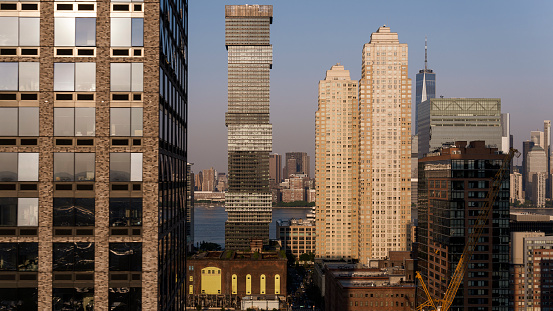 Modern buildings of Jersey City with the view of Hudson River and Lower Manhattan.