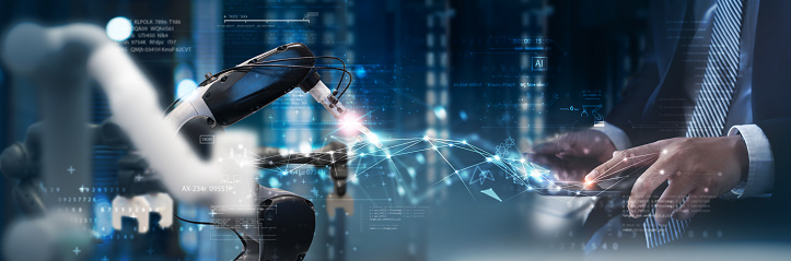 Robotics Control System Engineer Technical Industrial Engineer Using Digital Tablet For Robotics Control ...