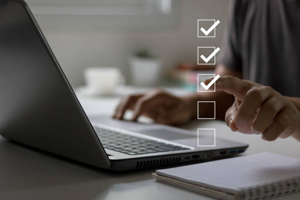 istock Business people tick the correct sign mark for document approval, project acceptance and quality assurance concept, Take an assessment, questionnaire, evaluation, survey, online exam, and checklist. 1508128442