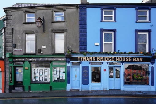 Dublin, Ireland - March 2023:  Colorful old business buildings in Kilkenny, Ireland