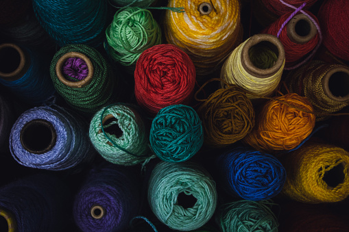 Traditional colored threads and yarns for material in textile factories and industries