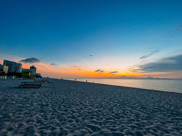 istock Colorful, Vibrant Clouds Just Before Sunset at Miami Beach in the Summer 1508301293