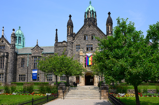 Toronto, Canada - July 1st, 2023: Trinity College is one of the seven constituent colleges of the University of Toronto in Canada. Founded in 1851, it is renowned for its academic excellence and historic campus located in downtown Toronto.