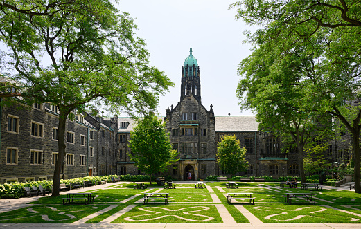 Toronto, Canada - July 1st, 2023: Trinity College is one of the seven constituent colleges of the University of Toronto in Canada. Founded in 1851, it is renowned for its academic excellence and historic campus located in downtown Toronto.